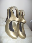 And again, from ShoeDazzle.com -  These looked way cooler online, and the fit really well, but I always seem to think my feet look like they're little gold astronauts when I wear 'em. They're mostly for show.