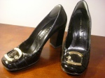 Sacha London (John David Shoes)   Black patent leather with gold buckle. For meetings and funerals. I was once told at a funeral that they looked very Chanel. I'll take that.