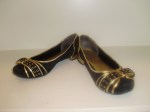 Nine West - I bought these online while I was pregnant thinking that if i was going to wear flats, I should wear black suede flats with gold trim. I can't take myself seriously wearing these. They look like something Liza Minelli would wear if she wore flats. (Nine West online)